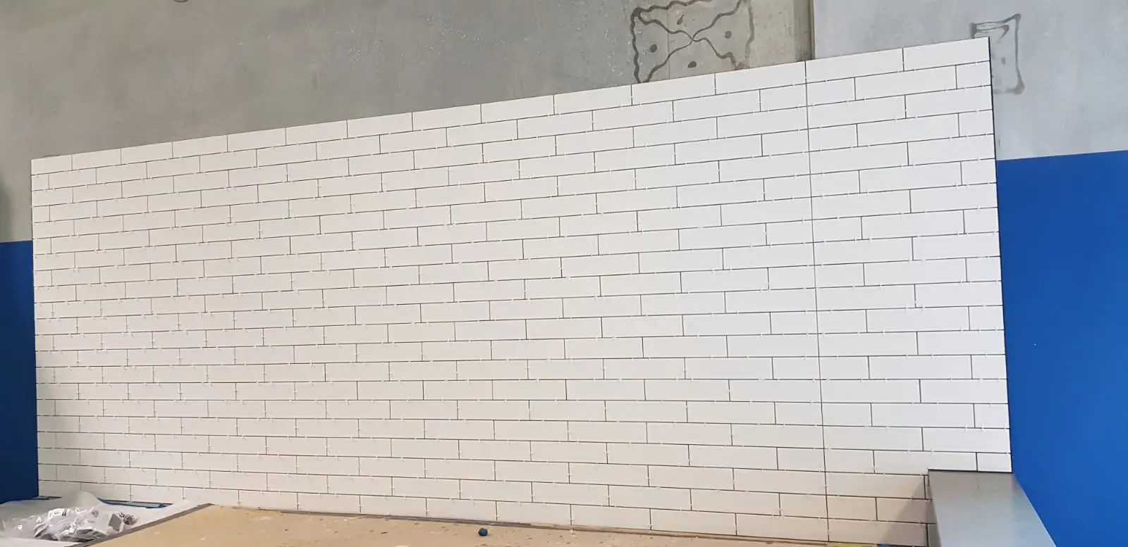 Modern white feature wall tiling professionally installed by HDR Tiling & Stone in Perth